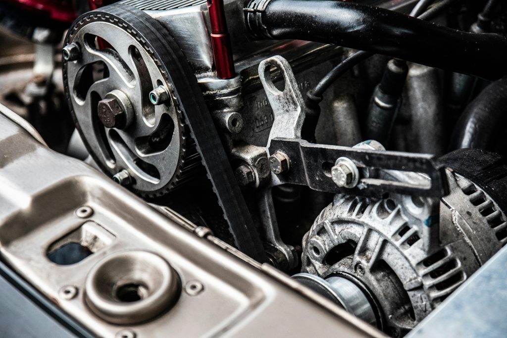 Close up photo of black and silver car engine